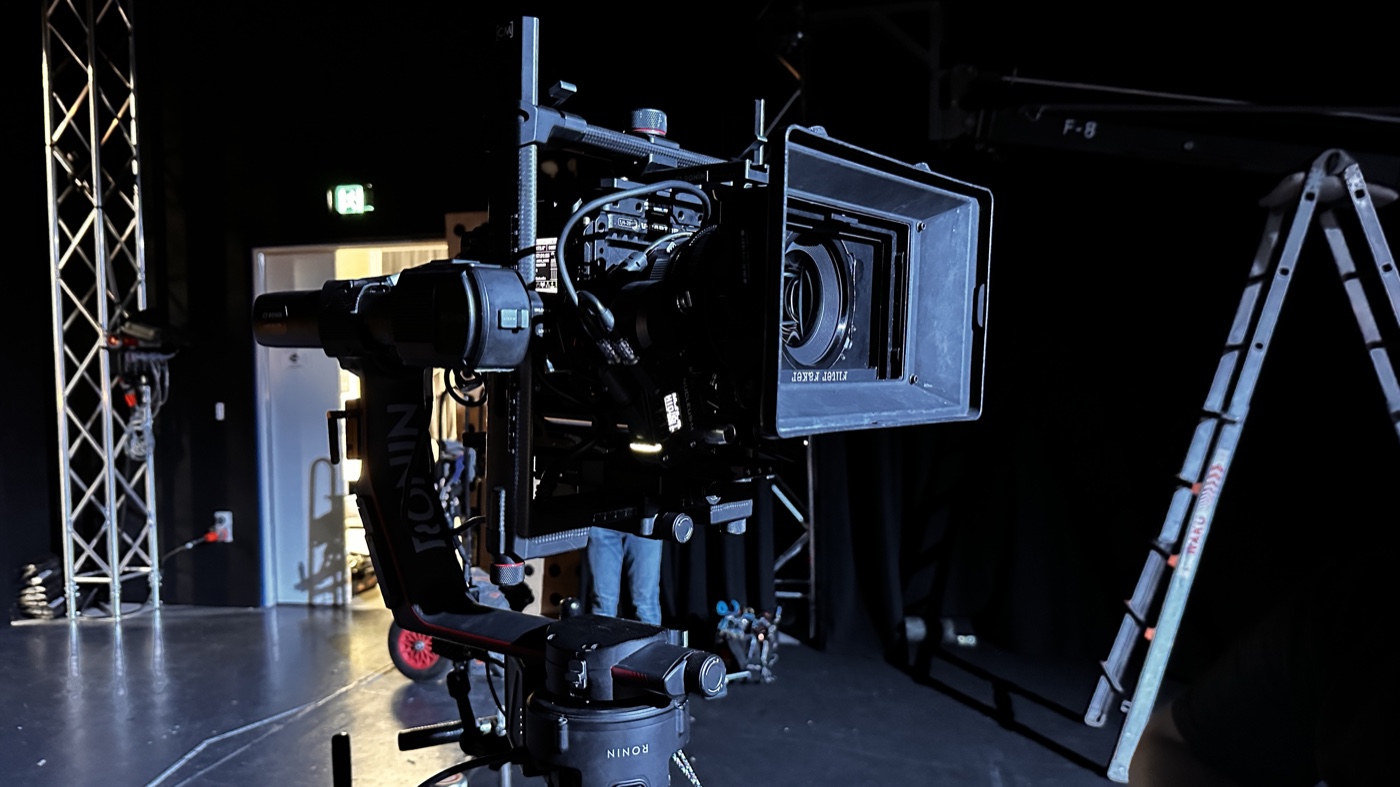 A cinema camera rigged on set